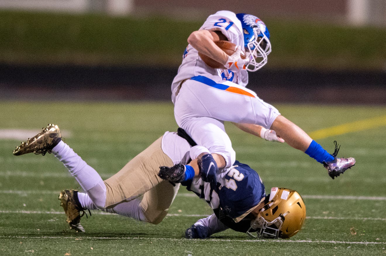 IHSAA football playoffs Cathedral stifles Whiteland run game in
