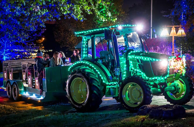 Visitors can bundle up and enjoy a nearly 30-minute ride around the property hayride style on the open-air Holiday Light Tour, pulled by a decked-out tractor. The ride is $20 per person.