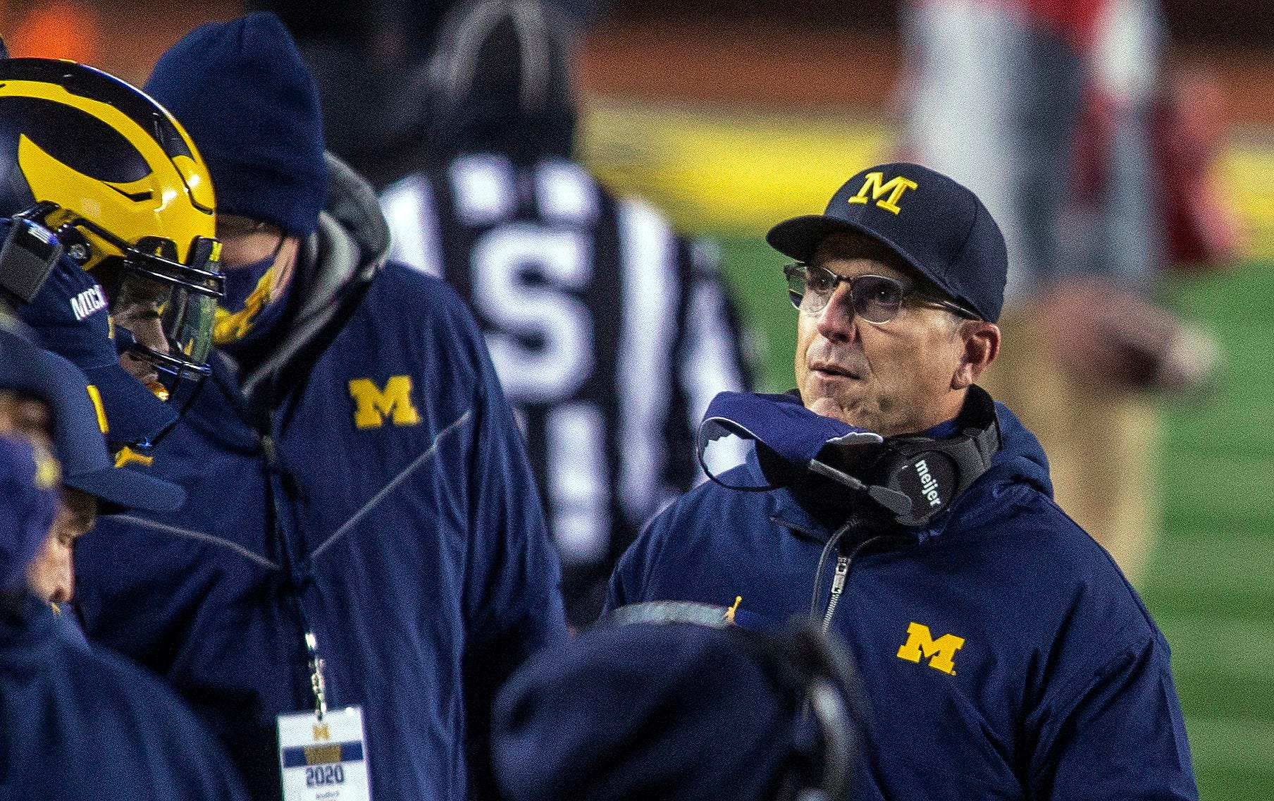 Michigan's Harbaugh needs to hit the road