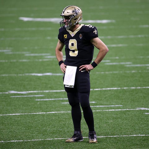 Drew Brees of the New Orleans Saints looks on duri