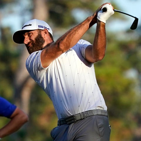 Jon Rahm, left, and others had been lurking behind