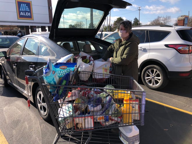 Val Grant of Wyandotte shopped as usual on Monday though she noticed Aldi in Wyandotte appeared to be more crowded.