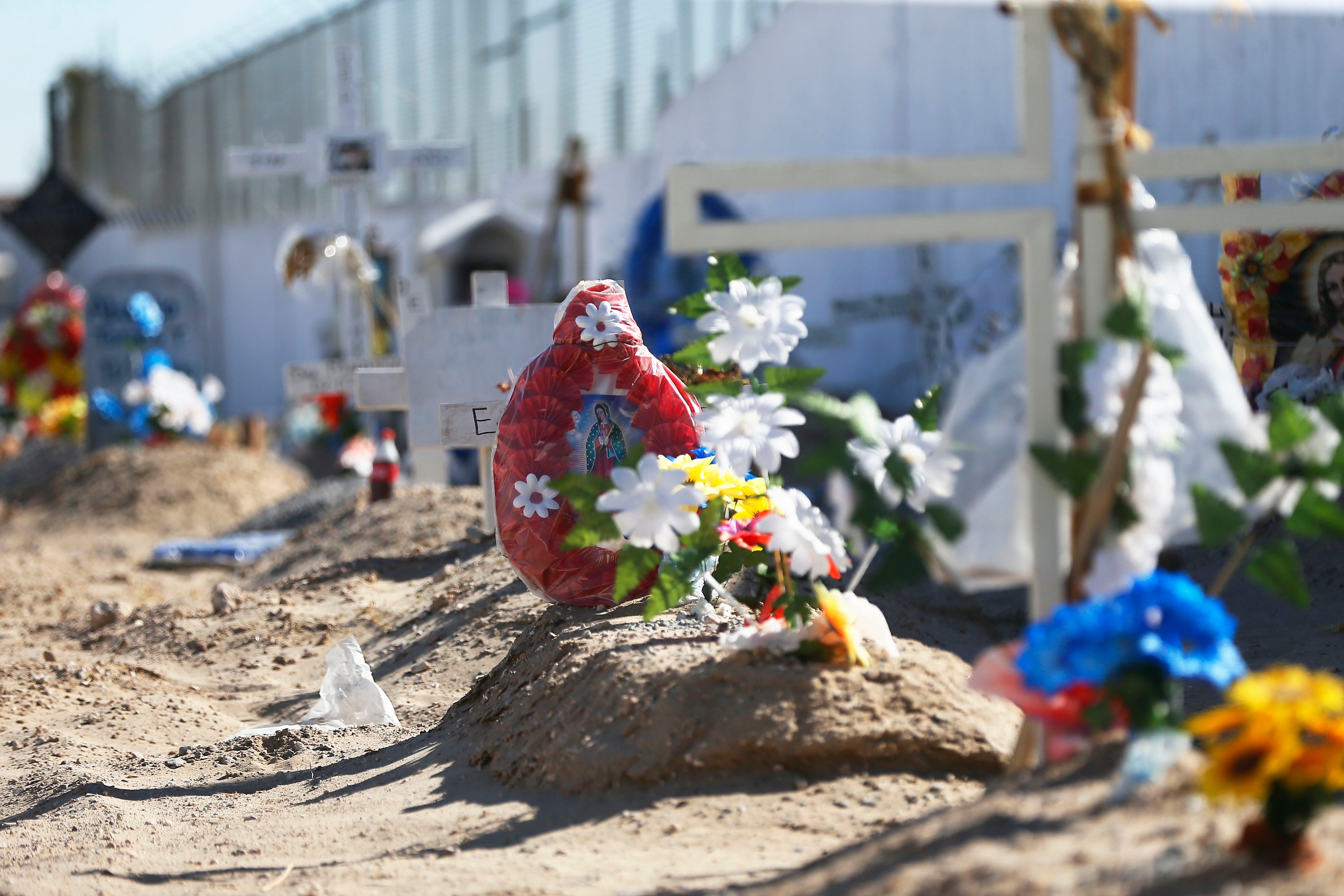 In this stage of the pandemic, more than 40 recent graves and funeral wreaths line up reaching the opposite corner of the cemetery in Ciudad Juárez, Mexico.