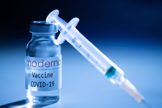 Moderna’s experimental COVID-19 vaccine on Nov. 16, 2020, in Paris.