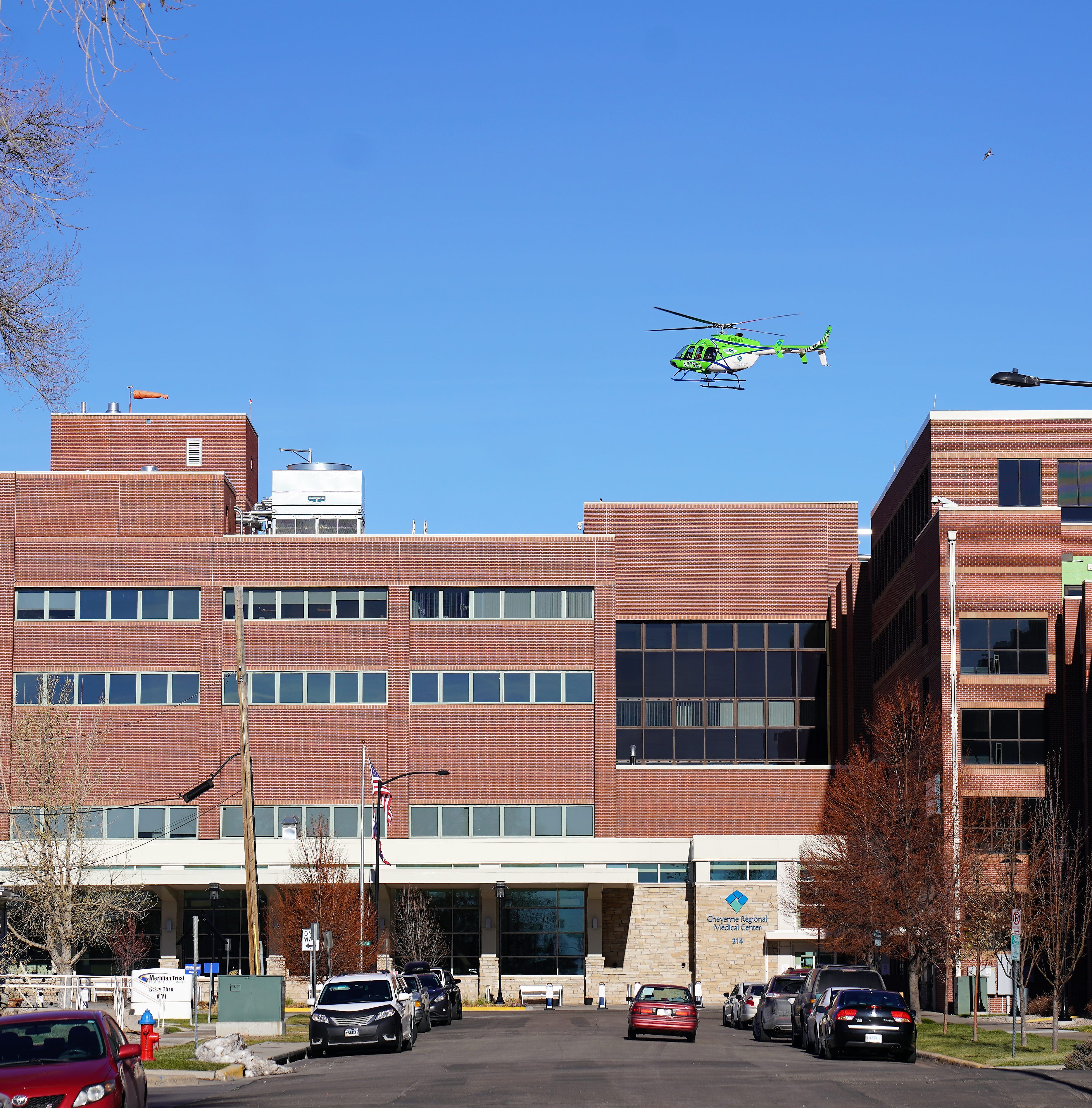 A medevac helicopter lands on the roof of the Cheyenne Regional Medical Center in downtown Cheyenne, Wyoming, on Nov. 16, 2020.