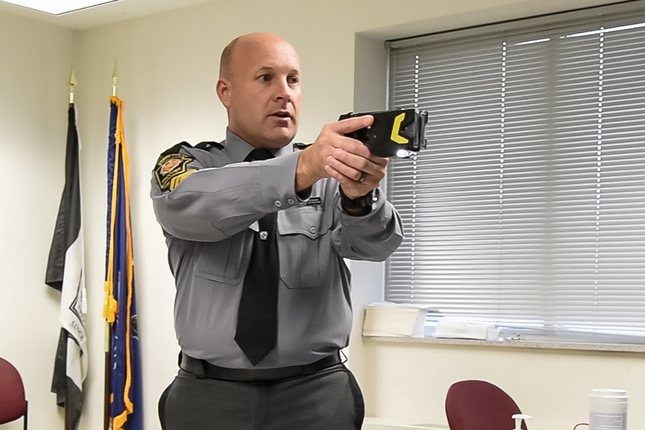 Pennsylvania State Police Sgt. Timothy Fetzer, a supervisor with the Use of Force Unit, demonstrates the complexities of tazer use during a use of force presentation at the Troop M Barracks in Bethlehem on Thursday, November 12, 2020. [MICHELE HADDON / PHOTOJOURNALIST]