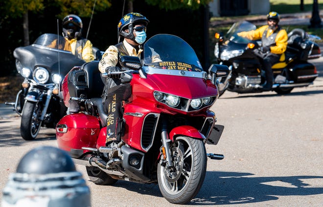 Members of the Montgomery Chapter of the Buffalo Soldiers Motorcycle Club ride in Montgomery, Ala., on Saturday November 14, 2020.