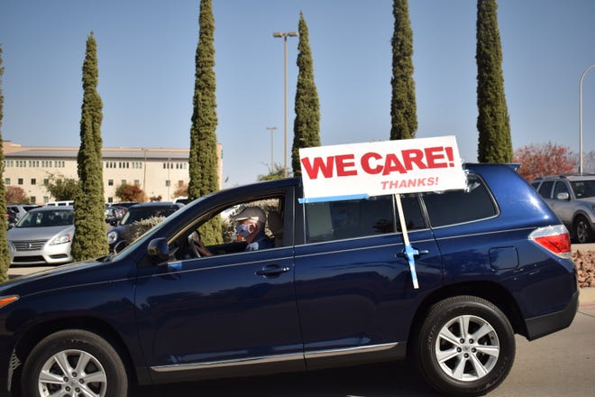 Caravan drives through the Mountain View Regional Medical Center to recognize the work of healthcare workers during the COVID-19 pandemic on Wednesday, Nov. 18, 2020.