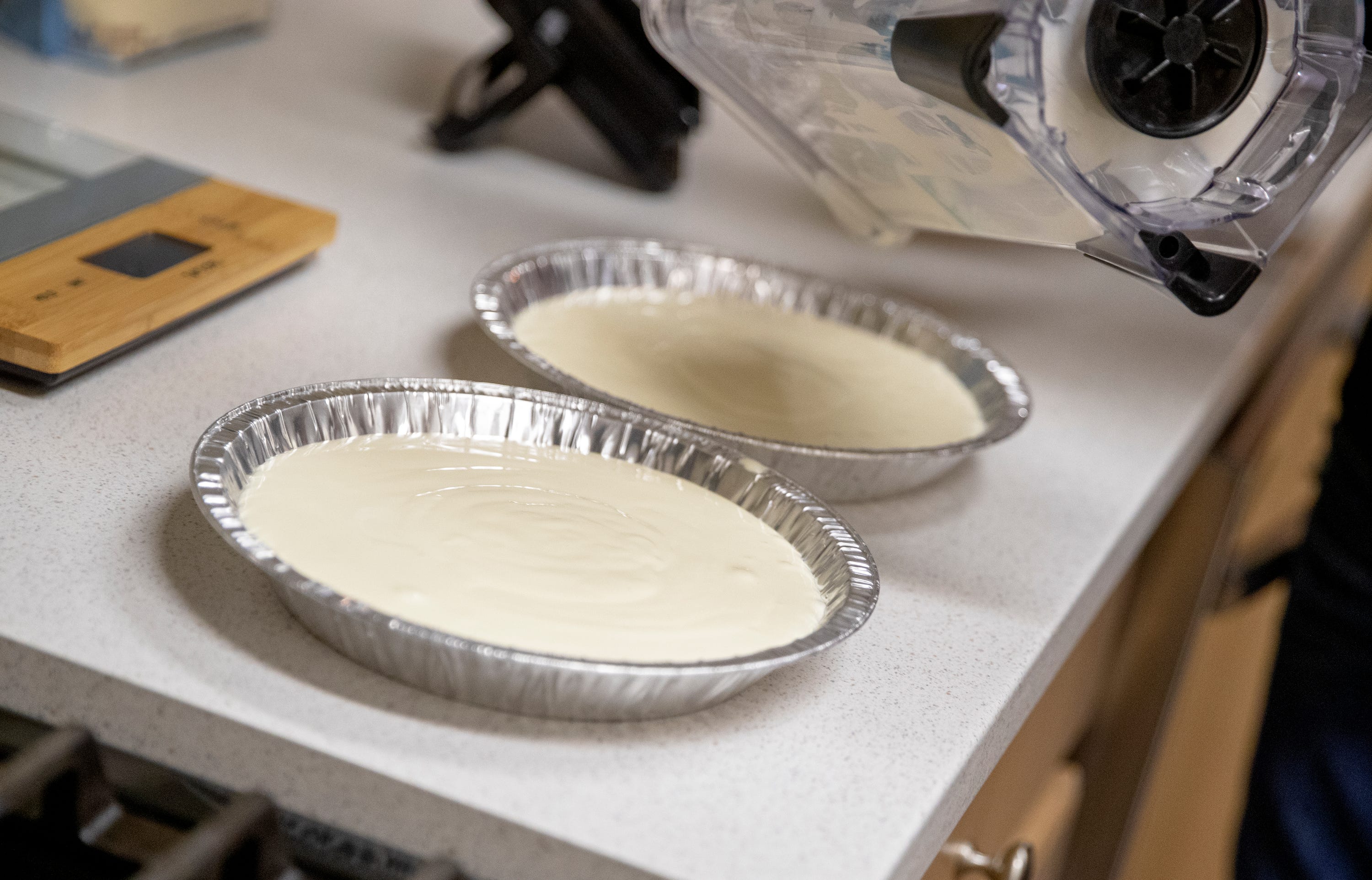 Sergio Garcia prepares his homemade cheesecake at his home in Desert Hot Springs, Calif., on November 6, 2020. Garcia applied for a home kitchen permit and currently makes gluten free and keto friendly cheesecakes based off of a family recipe.