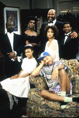 Janet Hubert, the actress who originated the role of Vivian Banks (second from left), with her co-stars (left to right) Joseph Marcell, James Avery, Karyn Parsons, Alfonso Ribeiro, (front row) Tatyana Ali and Will Smith.