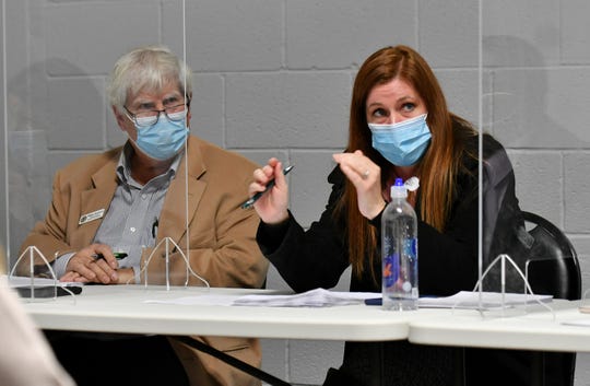 William Hartmann, left, and chairwoman Monica Palmer at the Wayne County Board of Canvassers meeting, which addressed the certification of the Nov. 3 election in Detroit on Nov. 17, 2020.