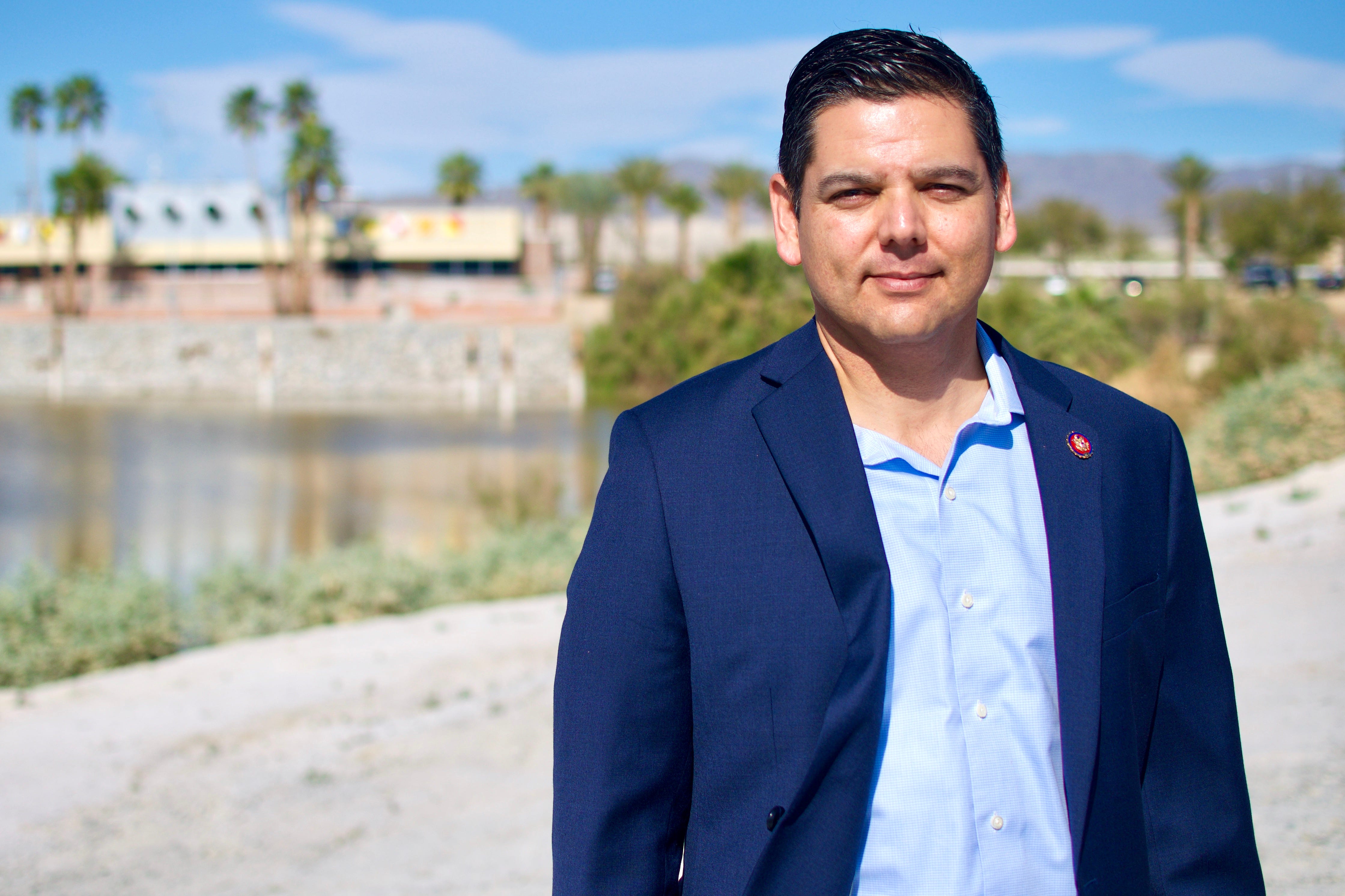 Rep. Raul Ruiz stands near the North Shore Yacht Club during a tour of the Salton Sea in March 2020. "It’s not that I’m opposed," Ruiz said of a sea-to-sea solution. "It’s that I have some more urgent, pressing needs right now to address."