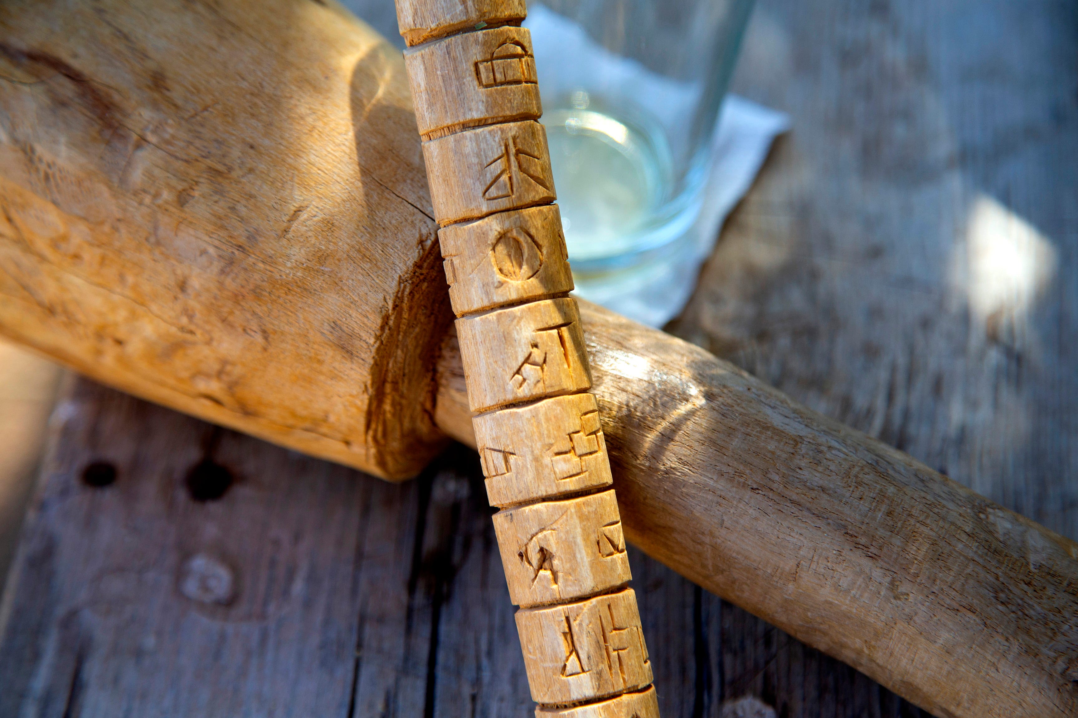 A calendar stick rests near the work area of Royce Manuel, Salt River Pima-Maricopa Indian Community elder.