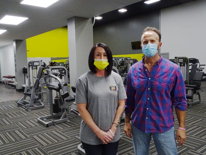 Hype Fitness manager Vicky Loterbaugh and owner David Smith spent four months prepping for the 24-hour gym's Court Drive opening. Now not facing full closure, they're still subject to a nightly curfew, which puts a dent in the round-the-clock business model.