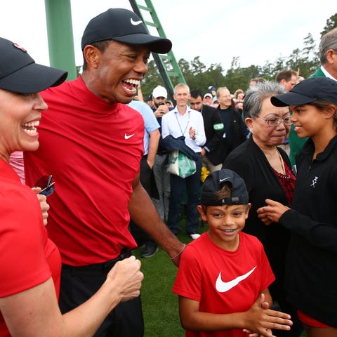 Apr 14, 2019; Augusta, GA, USA; Tiger Woods celebr