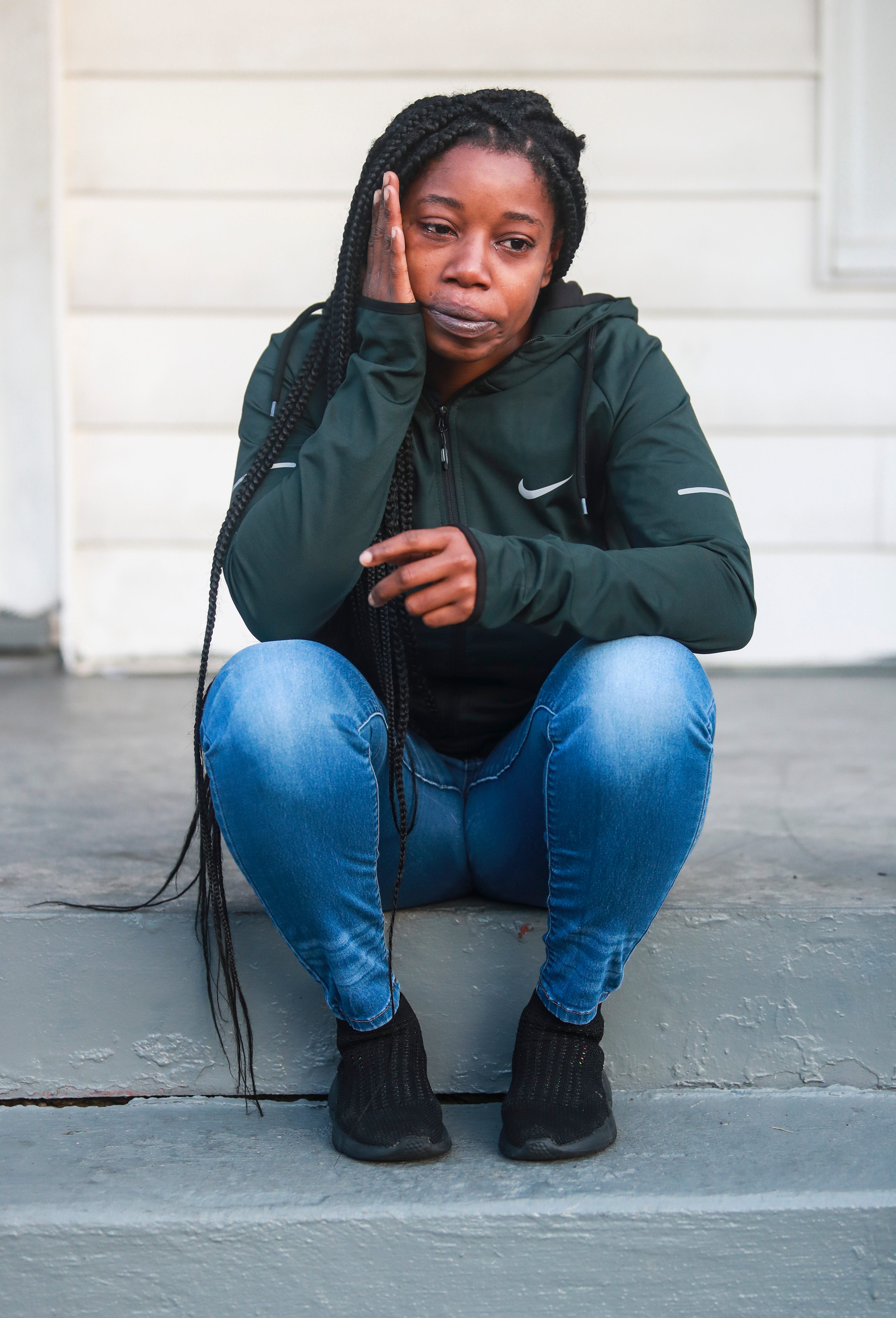 Kwmisha Adams cries while recounting her being evicted from her apartment earlier in the year amid COVID-19. She was evicted not for unpaid rent but because of a dispute the property manager had with her parking her disabled car — which was involved in an accident and had a broken radiator — in the complex's parking lot. Adams was able to get housing through Section 8 and lives in west Louisville. But she says once she gets back on her feet she'd like to live in Newburgh or Pleasure Ridge Park. Nov. 19, 2020