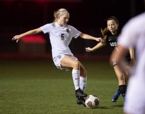 Delaney Williams (5) takes control of the ball during the Gulf Breeze vs West Florida girls soccer game at West Florida High School in Pensacola on Thursday, Nov. 19, 2020.
