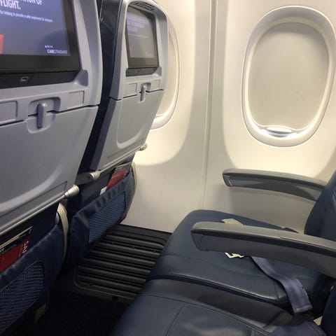 A treat on my Delta flight: two empty seats. The a