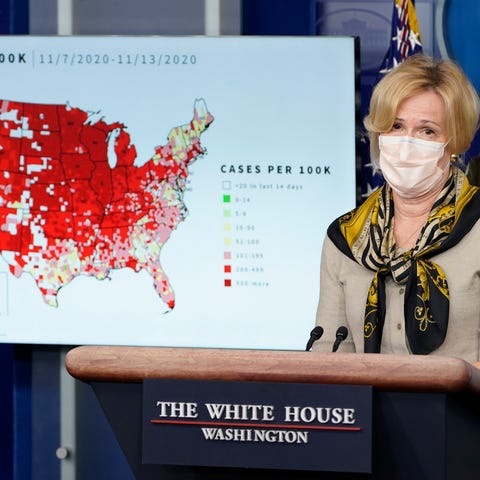 With a map of the country's COVID-19 outbreak behi