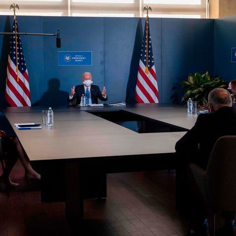 President-elect Joe Biden (center) speaks Nov. 20,