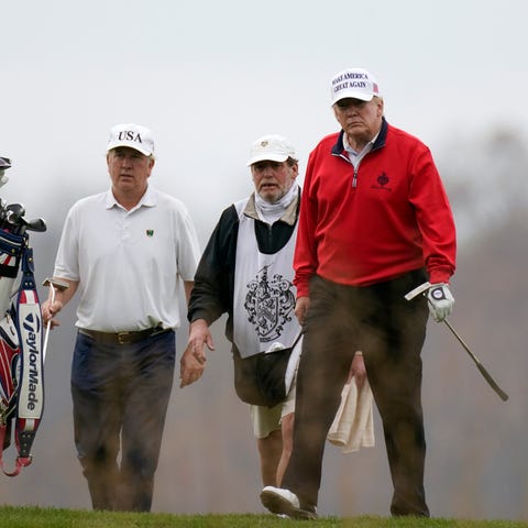 President Donald Trump plays golf at Trump Nationa