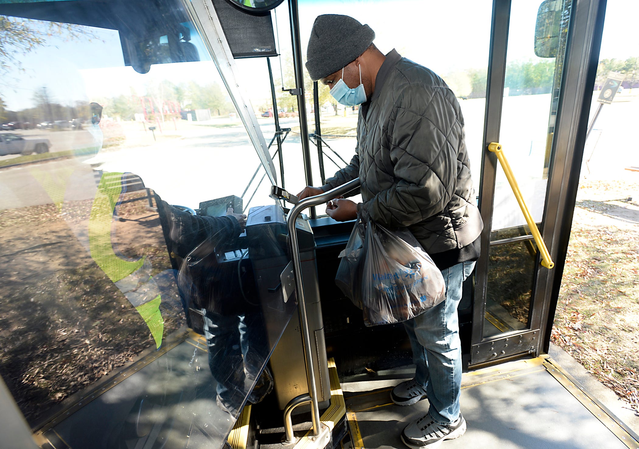 Robert Harris' trip from the south side to the east side by bus only covers 12 miles round-trip. It can take him as long as five hours. He repeats the process four times a month to buy groceries.