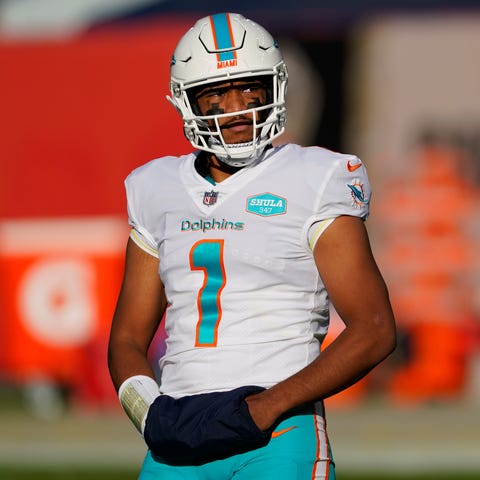 Miami Dolphins quarterback Tua Tagovailoa (1) agai