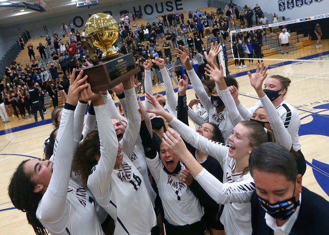 Hamilton celebrates winning the 6A High School Girls Volleyball State Championship over Perry in Gilbert, Ariz. on Nov. 21, 2020. 