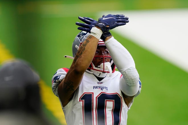 New England wide receiver Damiere Byrd celebrates a touchdown catch against the Texans during Sunday's game.