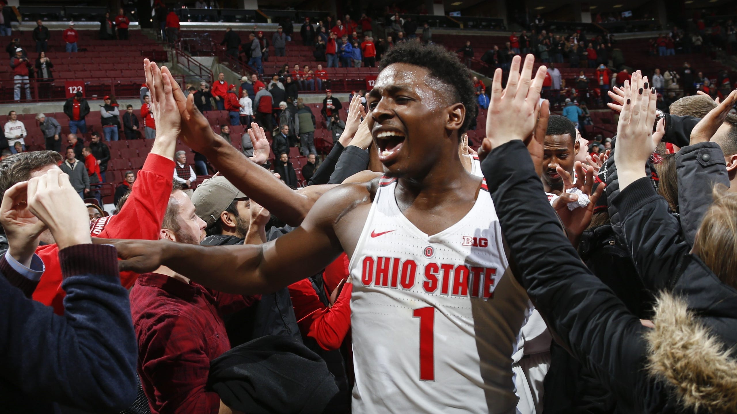 Ohio State Buckeyes forward Jae'Sean Tate (1) celebrates as he heads to the locker room following the Buckeyes' 80-64 victory against the Michigan State Spartans during a NCAA men's basketball game on Sunday, January 7, 2018 at Value  City Arena in Columbus, Ohio. [Joshua A. Bickel/Dispatch]