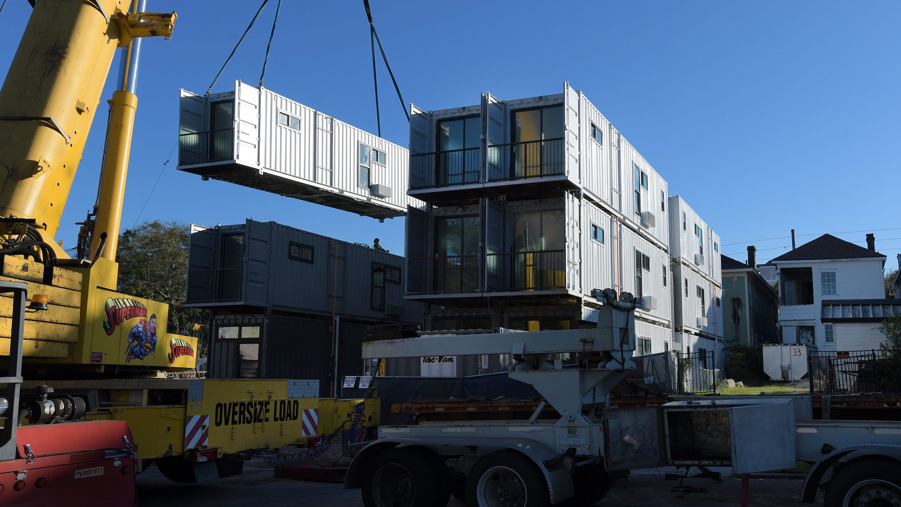 The creation of apartments and Airbnb rentals out of cargo containers is taking place on Ashley Street near more traditional homes in the downtown Cathedral District.