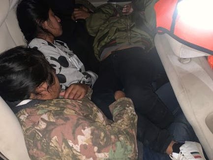 Border Patrol agents found 10 migrants squeezed into a sedan that drove illegally over the border into Arizona through a gap in border wall construction east of Douglas on Oct. 15, 2020.