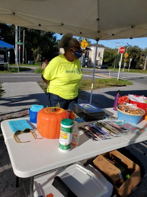 Rotarian Lorain Vinson at the Rotary Club information tent at the October Supper Truck Saturday in Hastings. 