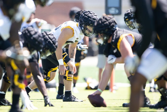 Missouri defensive lineman Cannon York, middle, lines up for a play during practice Aug. 17 at the Kadlec Practice Fields.