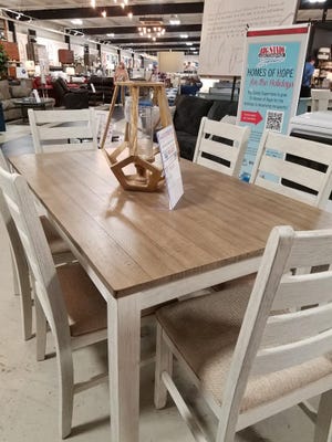 A dining set at Big Sandy Superstore. The store is giving away a home full of furniture to one Marion family in need.
