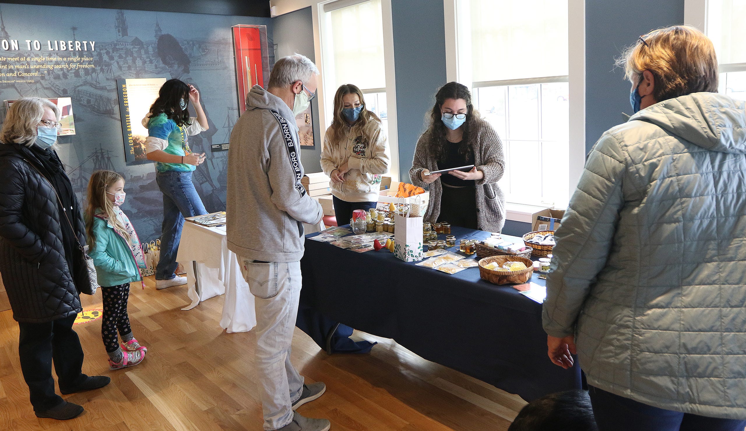 The Lexington Visitors Center was home to members of the Lexington High School "Bee Club" as they volunteered with the Lexington Bee Company on Small Business Saturday in Lexington, Nov. 28.