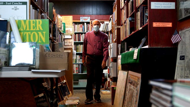 Felton Cochran runs Cactus Book Shop in San Angelo with quiet dignity and yet passionate interest.
