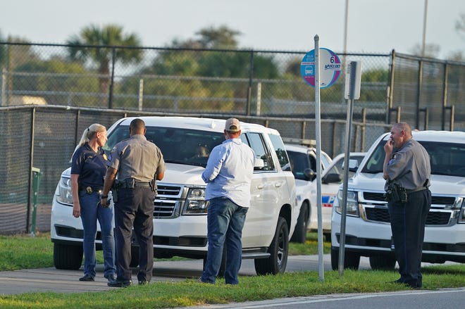 Daytona Beach police investigate a shooting at Derbyshire courts in Daytona Beach, Sunday, Nov. 29, 2020.