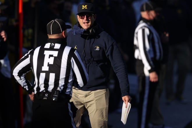 Head coach Jim Harbaugh of the Michigan Wolverines reacts in the second half while playing the Penn State Nittany Lions at Michigan Stadium on Nov. 28, 2020 in Ann Arbor, Michigan.