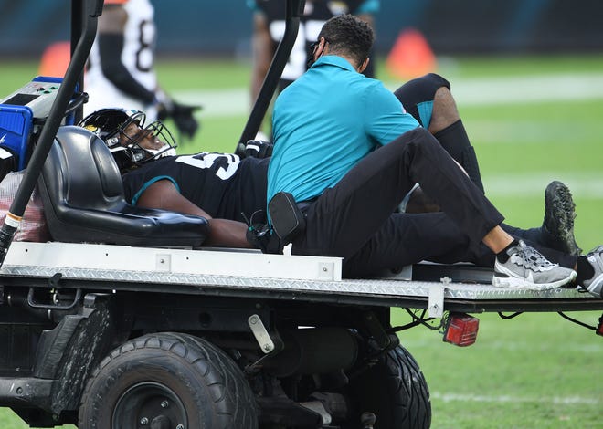 The sight of Jaguars' defensive tackle DaVon Hamilton (52) being carted off the field late in the fourth quarter only made a disheartening 27-25 loss to the Cleveland Browns that much harder to take.