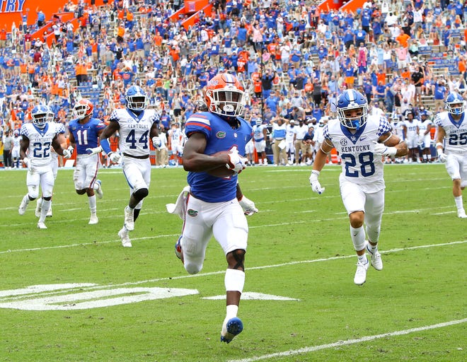 Kadarius Toney's 50-yard punt return for a touchdown swung the momentum in Florida's favor Saturday and shut the door on Kentucky's upset bid during the Gators' 34-10 win.