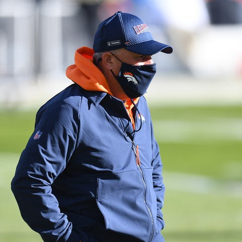 Denver Broncos head coach Vic Fangio looks on befo