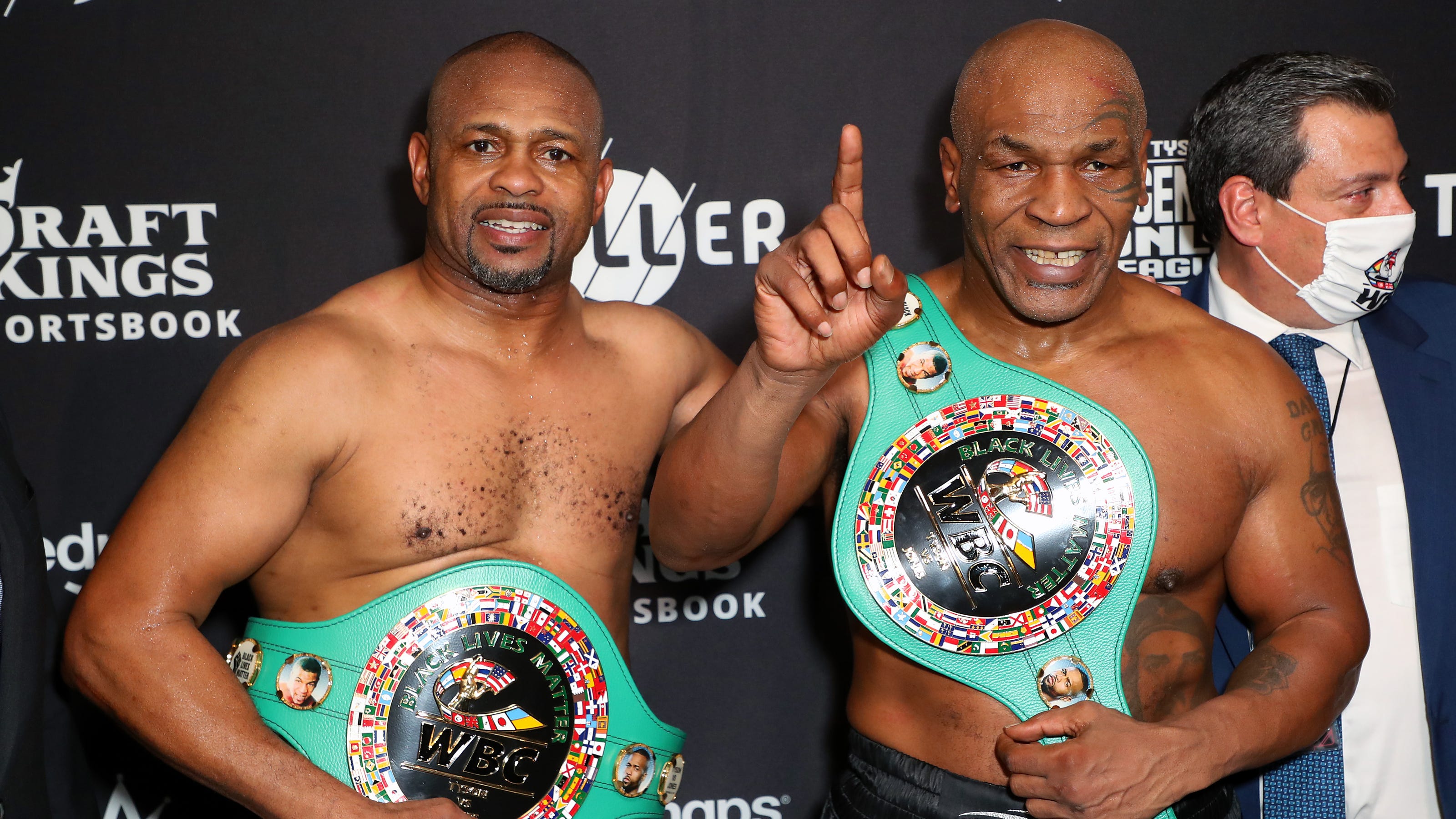 Mike Tyson can fight for heavyweight title, Foreman says