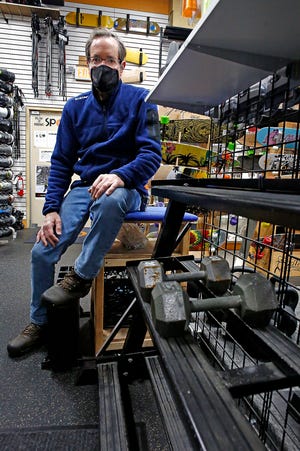 Andy Demain, co-owner of the Play It Again Sports on Sawmill Road, said some exercise gear, including weights, has been in huge demand during the COVID-19 pandemic.