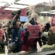 Demonstrators chant outside the window of the Michigan Senate Oversight Committee's meeting room on Tuesday, Dec. 1, 2020.