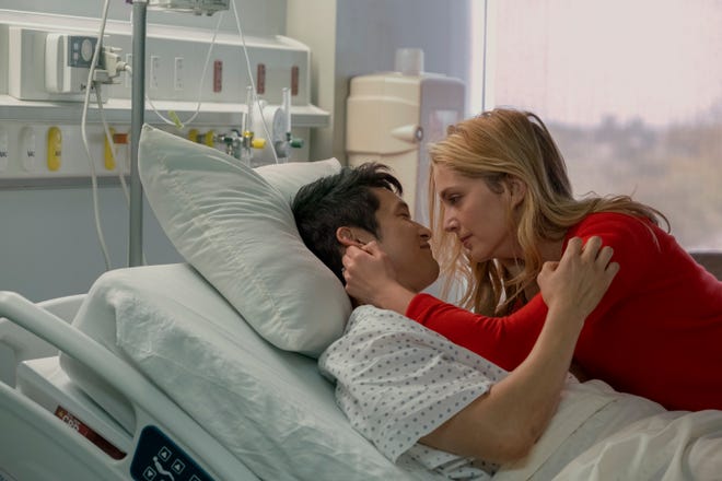 Harry Shum Jr., left, and Jessica Rothe have a tender moment in "All My Life."
