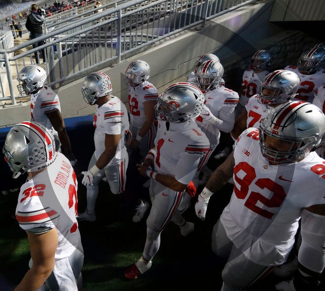 In this file photo, Ohio State players get ready to take the field for the game at Penn State on Oct. 31.