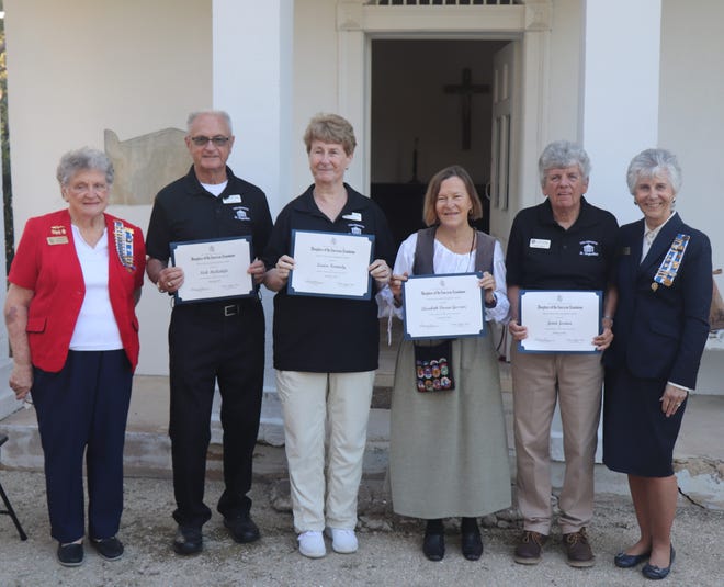 From left, Shirley Thomson; Don and Joan Roberts, accepting awards on behalf of Nick McAuliffe and Louise Kennedy; Elizabeth Gessner; Janet Jordan; and Lynne Cason.