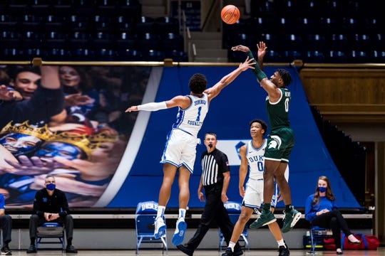 Michigan State's Aaron Henry shoots against Duke during the Champions Classic at Cameron Indoor Stadium in Durham, N.C. on Dec. 1, 2020.