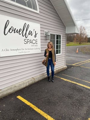 Amy Gaines Scholl stands in front of her new business venture, Louella's Space, in the former Stella's Restaurant in Newfield.